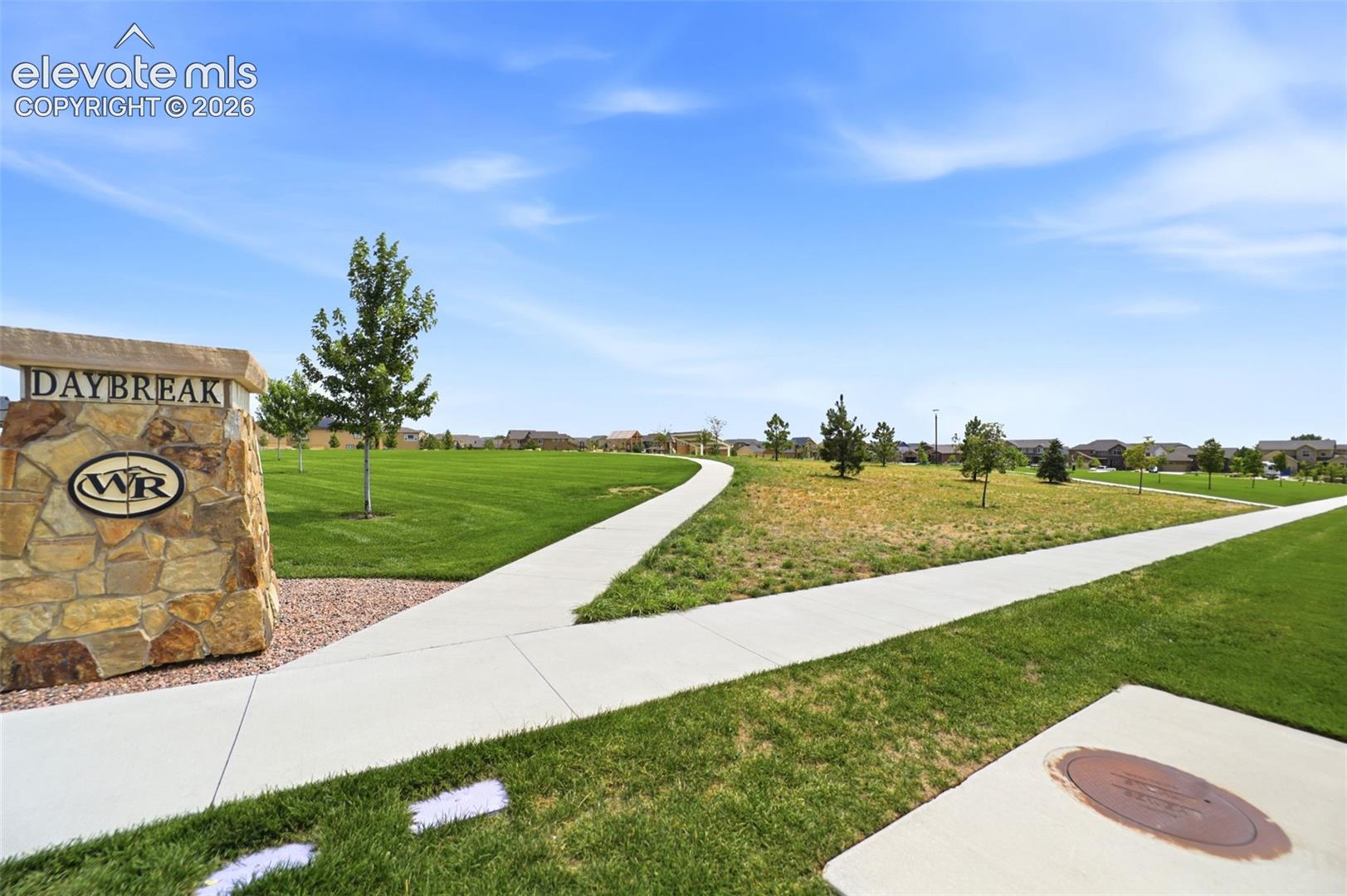 Miles of concrete walking paths and expansive green spaces