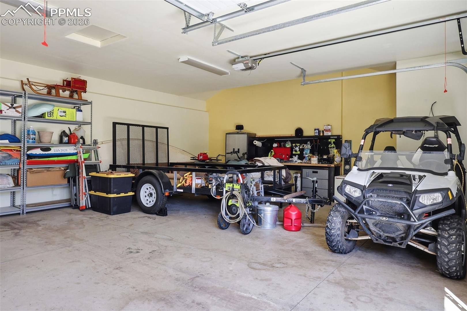 2 1/2 car garage provides ample storage and a place for your hobby workshop. 