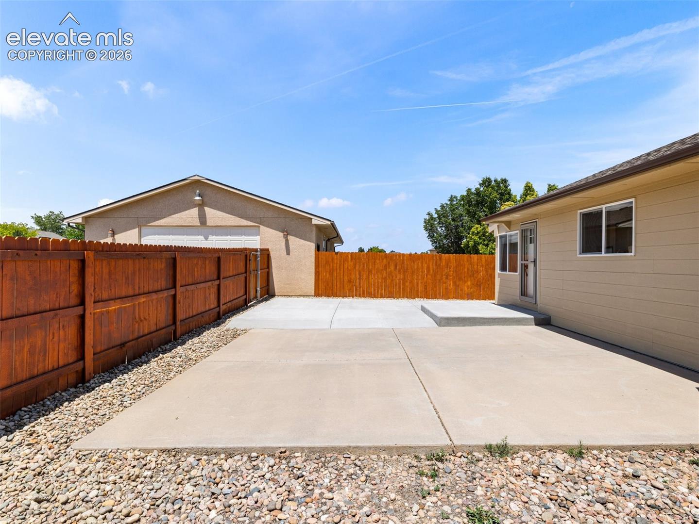 This fenced in yard is for the ADU