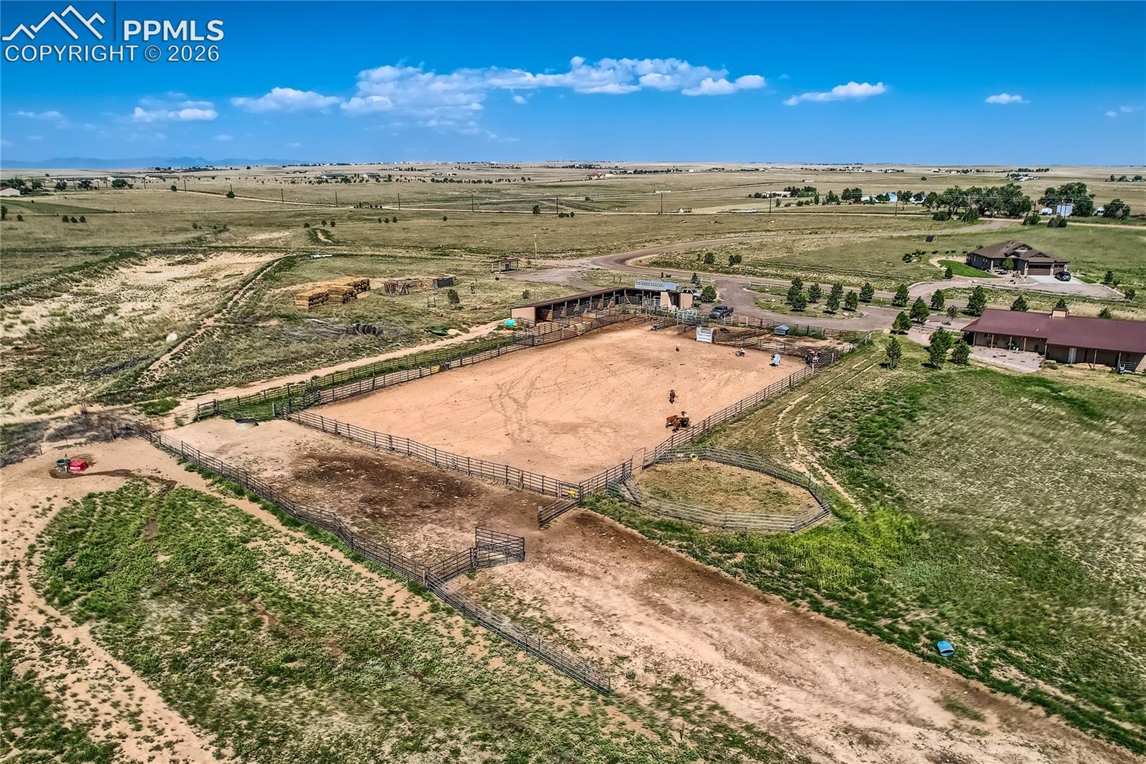 COMMUNITY BARN, ARENA & STALLS