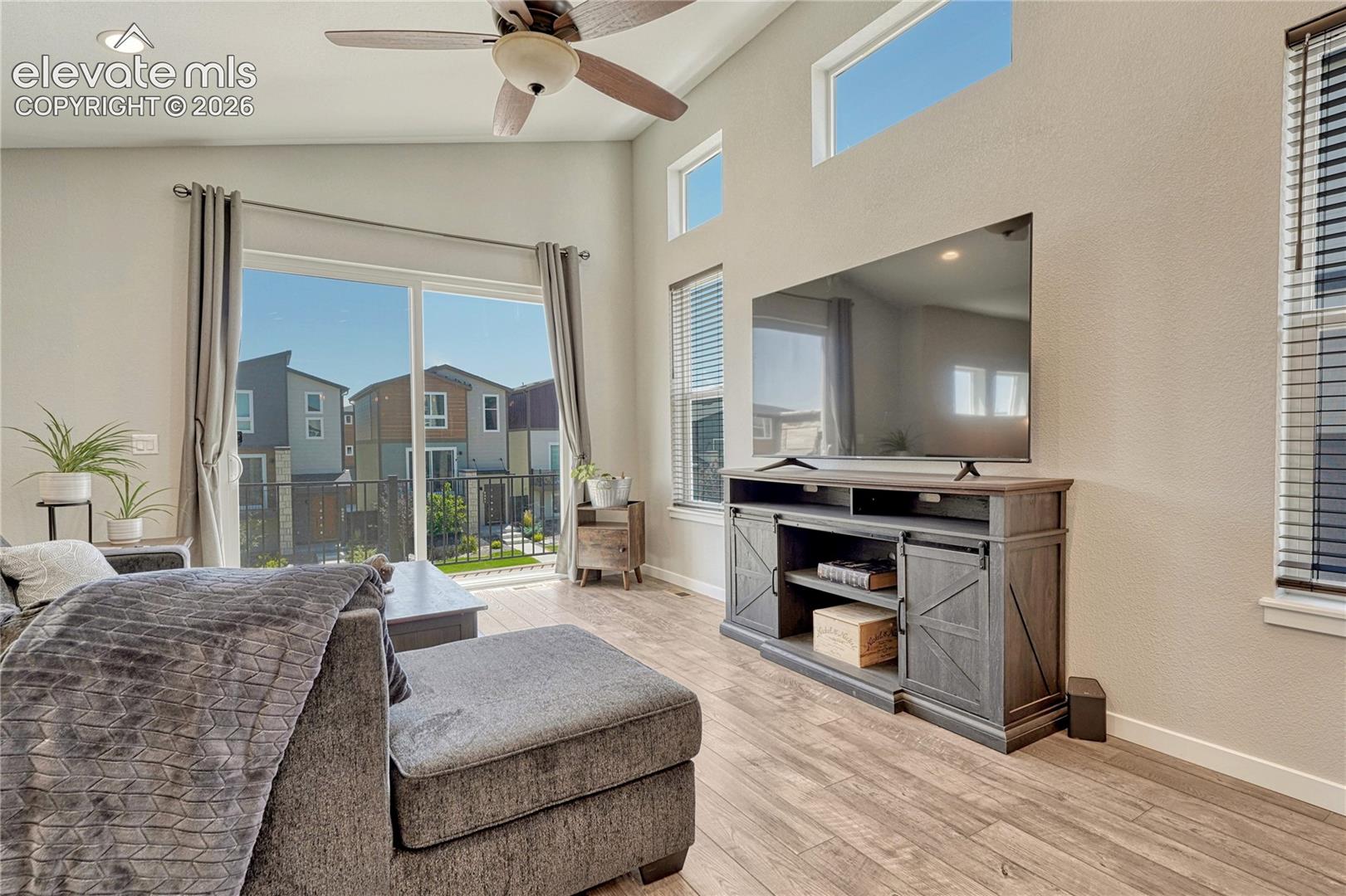 Great room offers abundant natural light. 