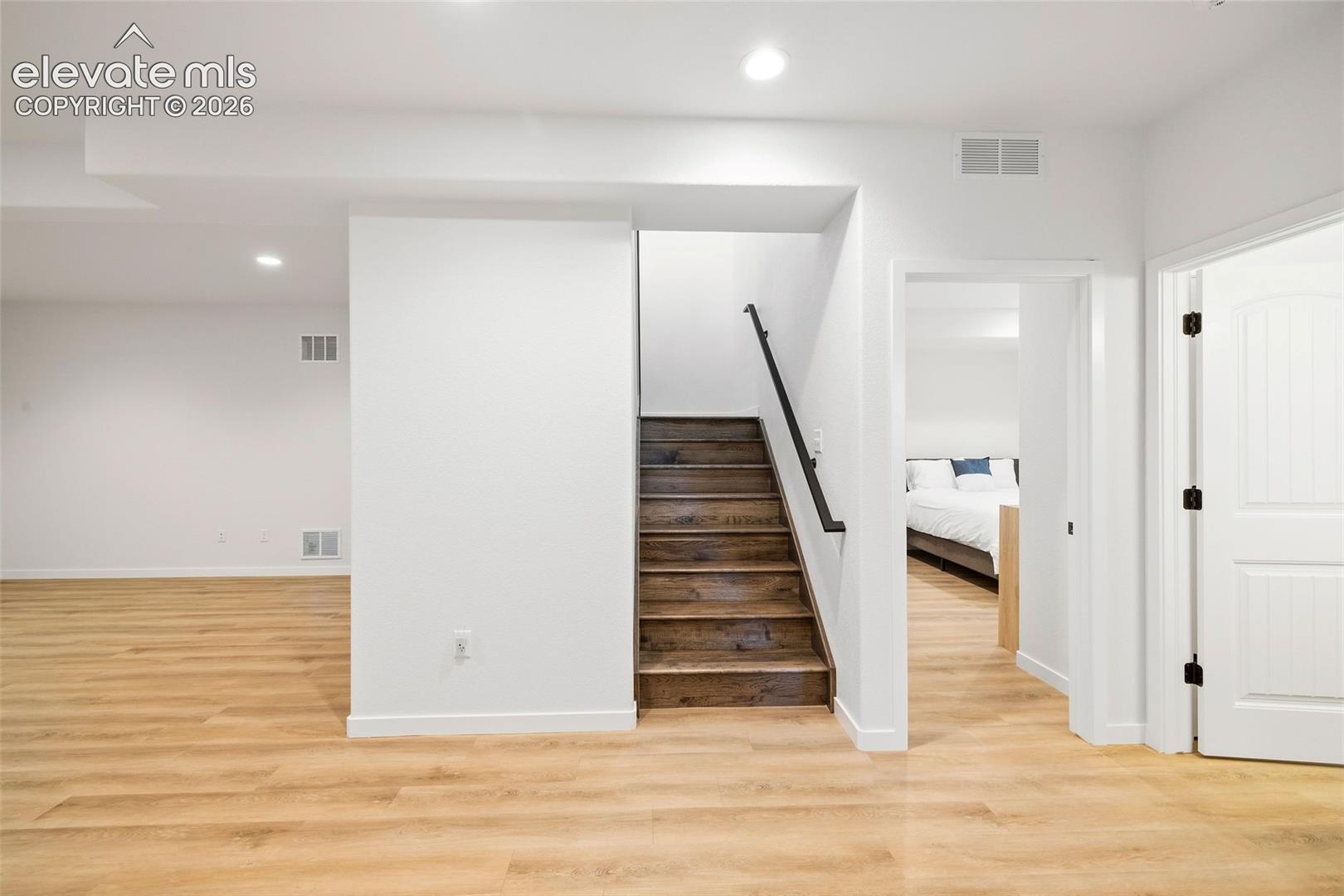Spread out and have fun! The lower-level family room has LVP floors and plenty of space for entertaining, a home theater, a play room, whatever you wish! 