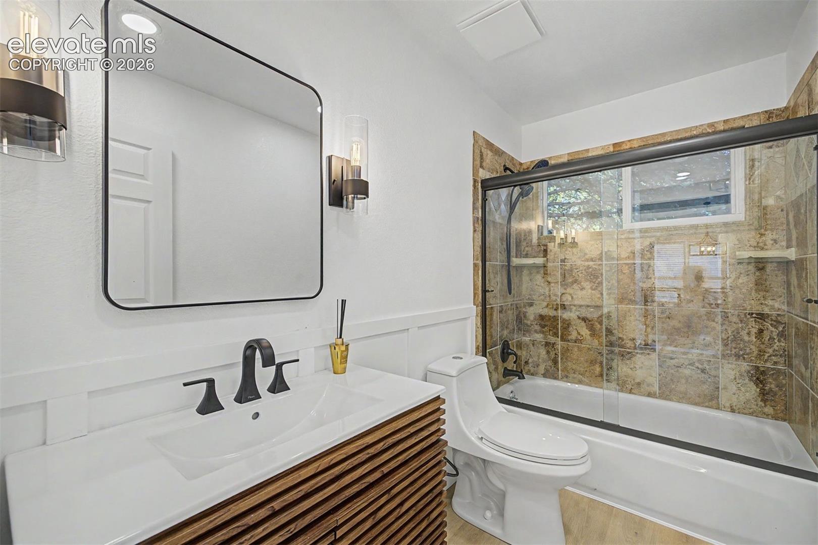Full bathroom on main floor with beautiful upgrades