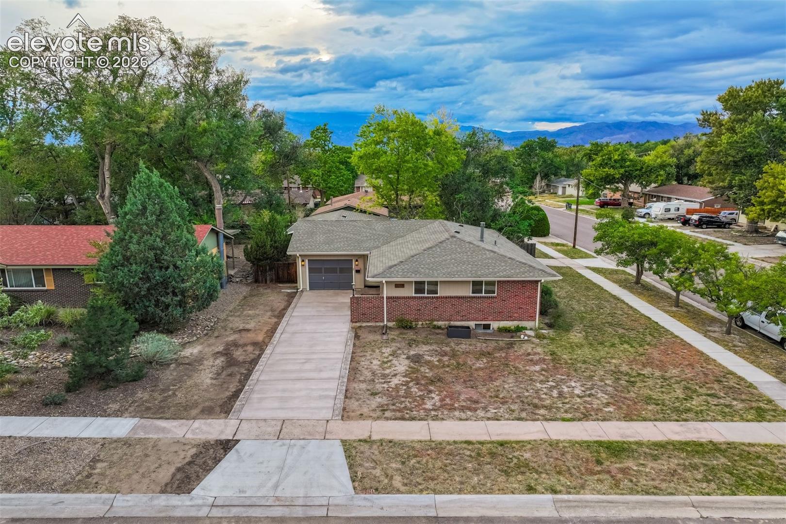 Extended front driveway with access to one car garage. 