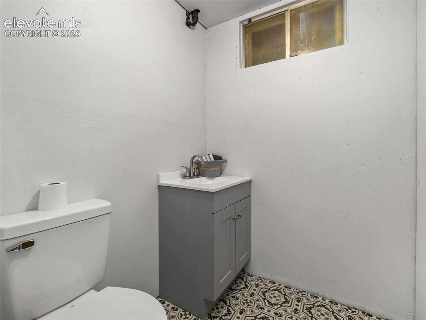 1/2 bath in basement adjacent to rec room