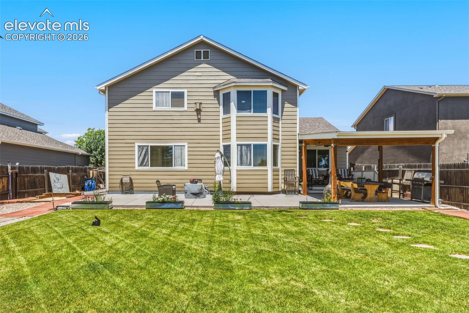 Spacious Backyard with Room to Relax, Play & Entertain