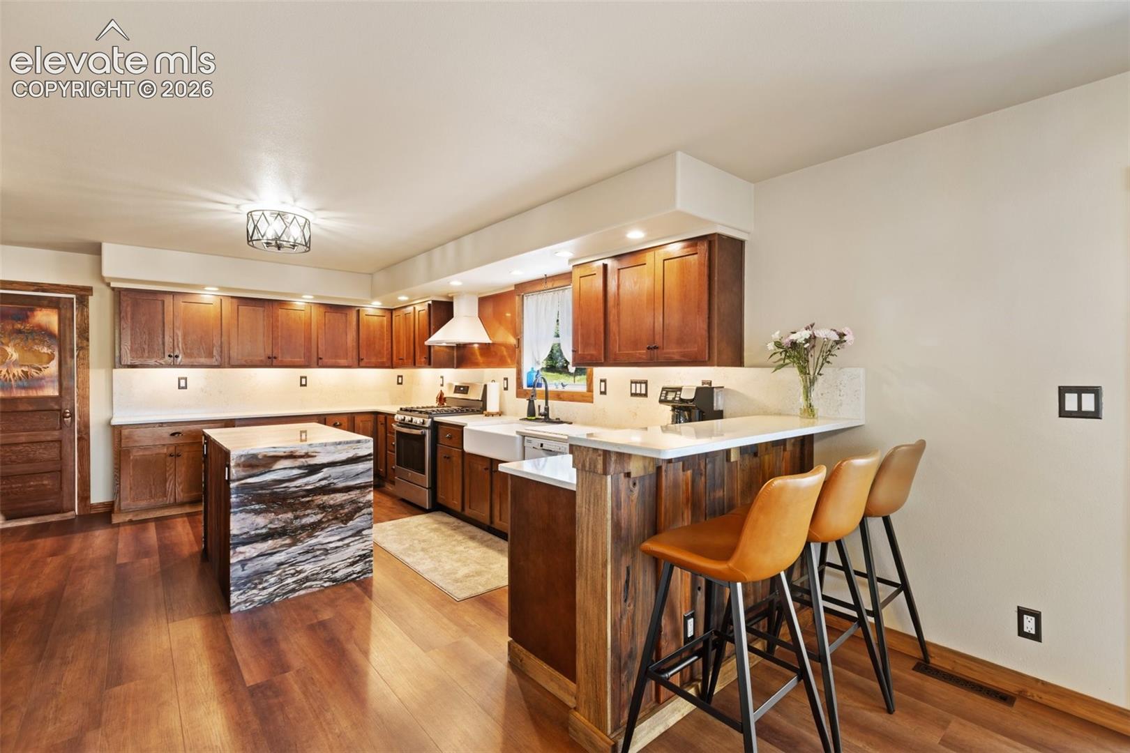 Kitchen Island and Breakfast bar. 