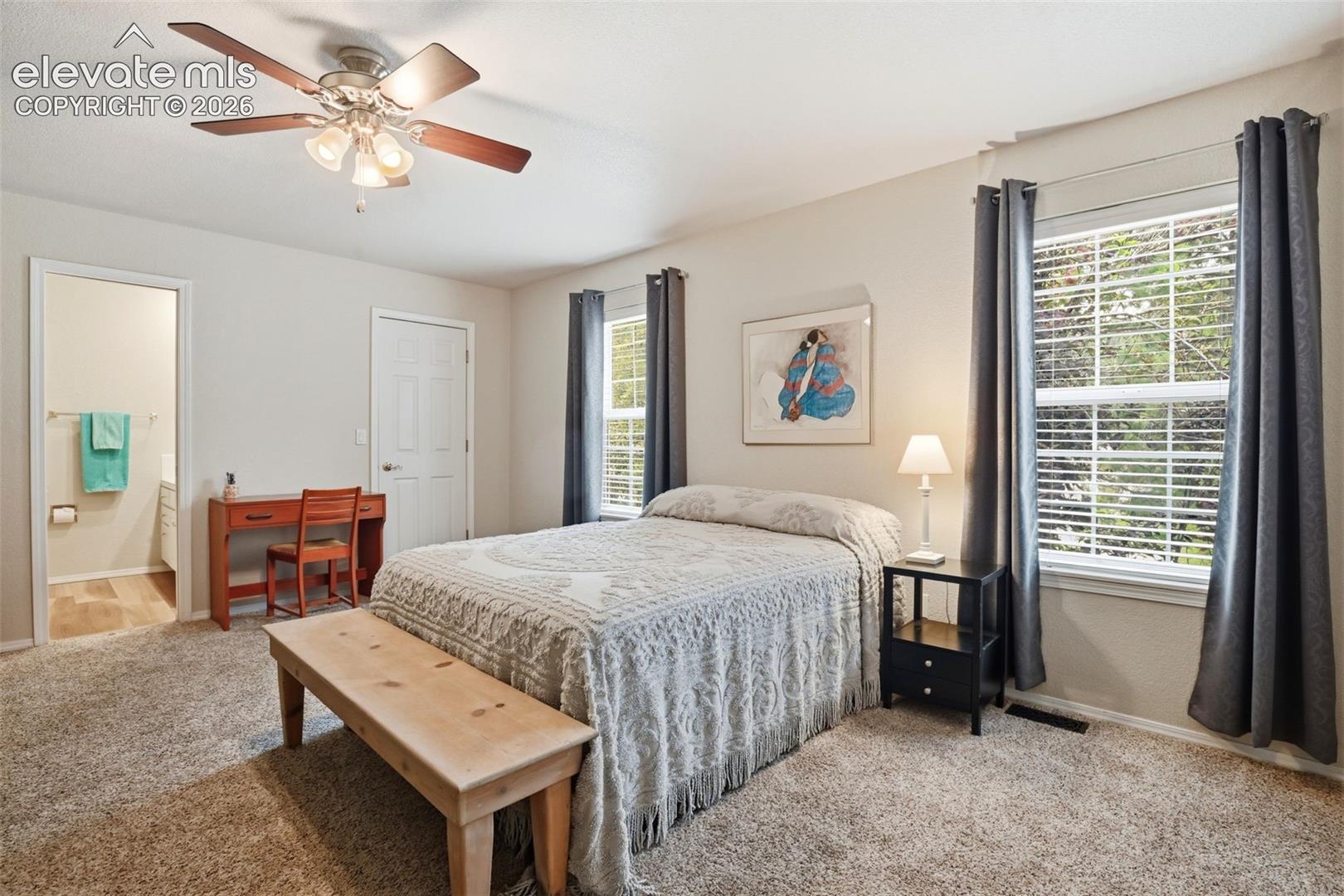 Large upstairs secondary suite w/ ensuite bath and walk-in closet and siting room.