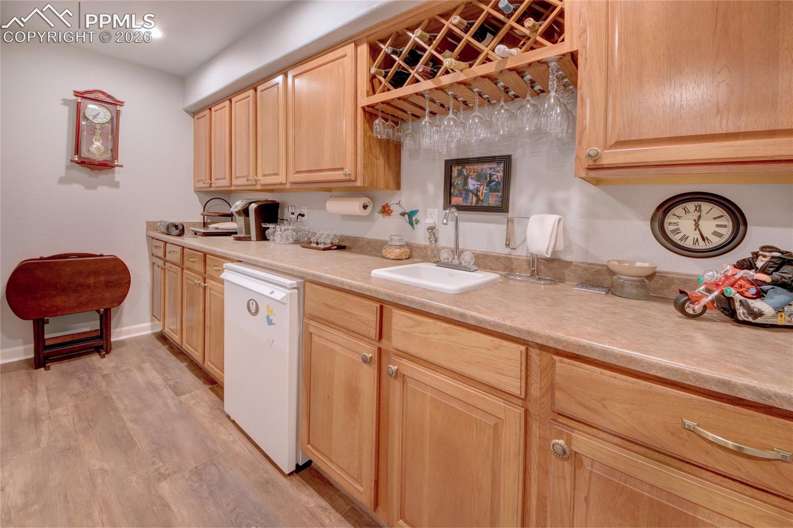 Family room wet bar and refrigerator