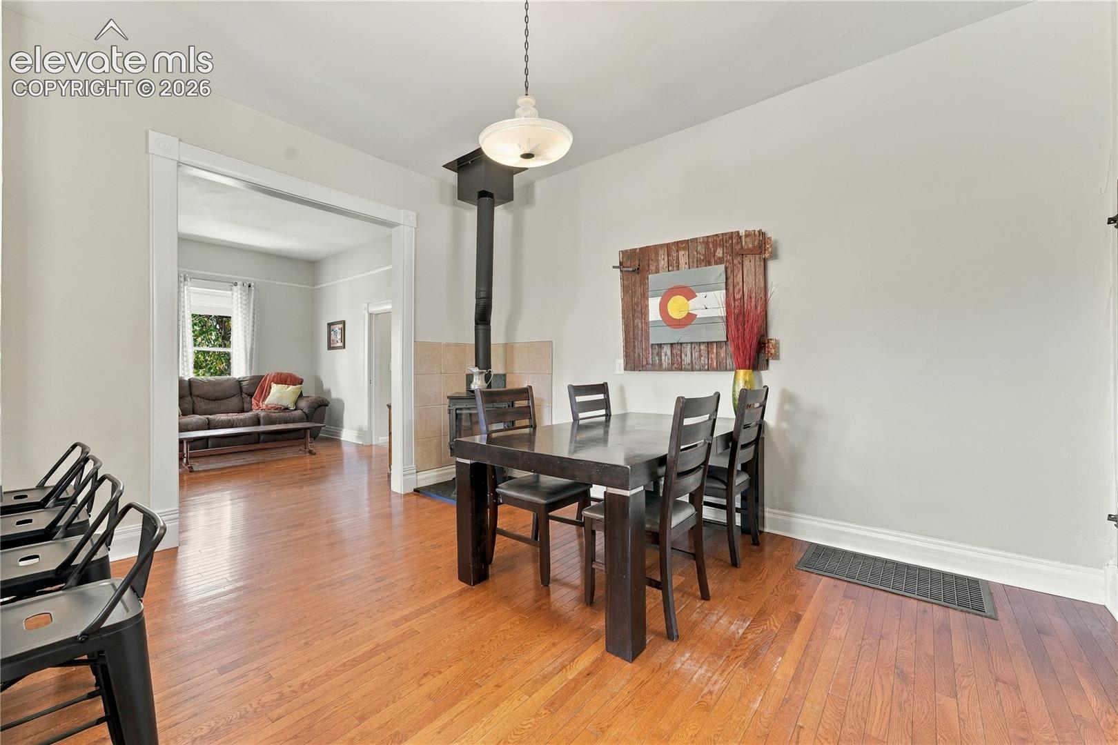 Dedicated dining area with wood burning stove