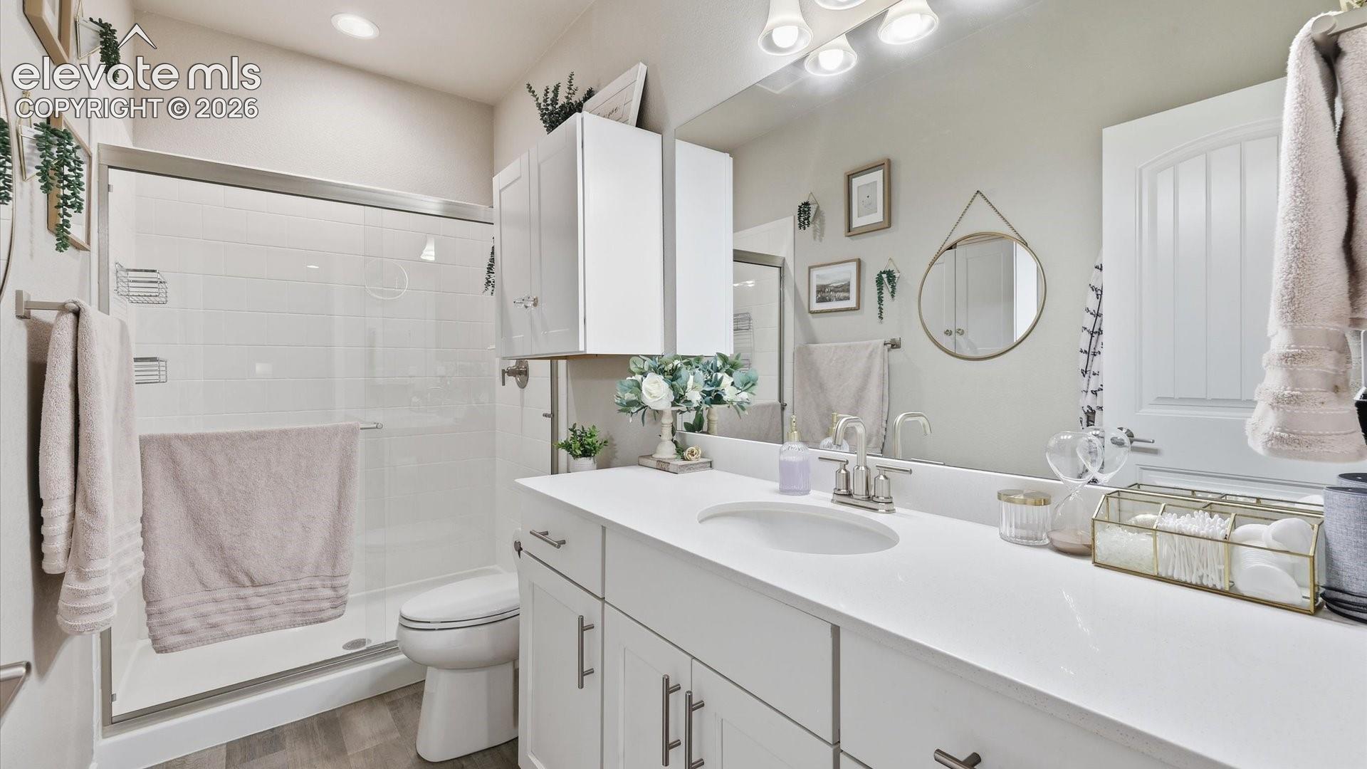 EVERY DETAIL CONSIDERED — Even the fifth bathroom reflects the home’s commitment to comfort, style, and functionality—ensuring family and guests have beautifully appointed spaces throughout.
