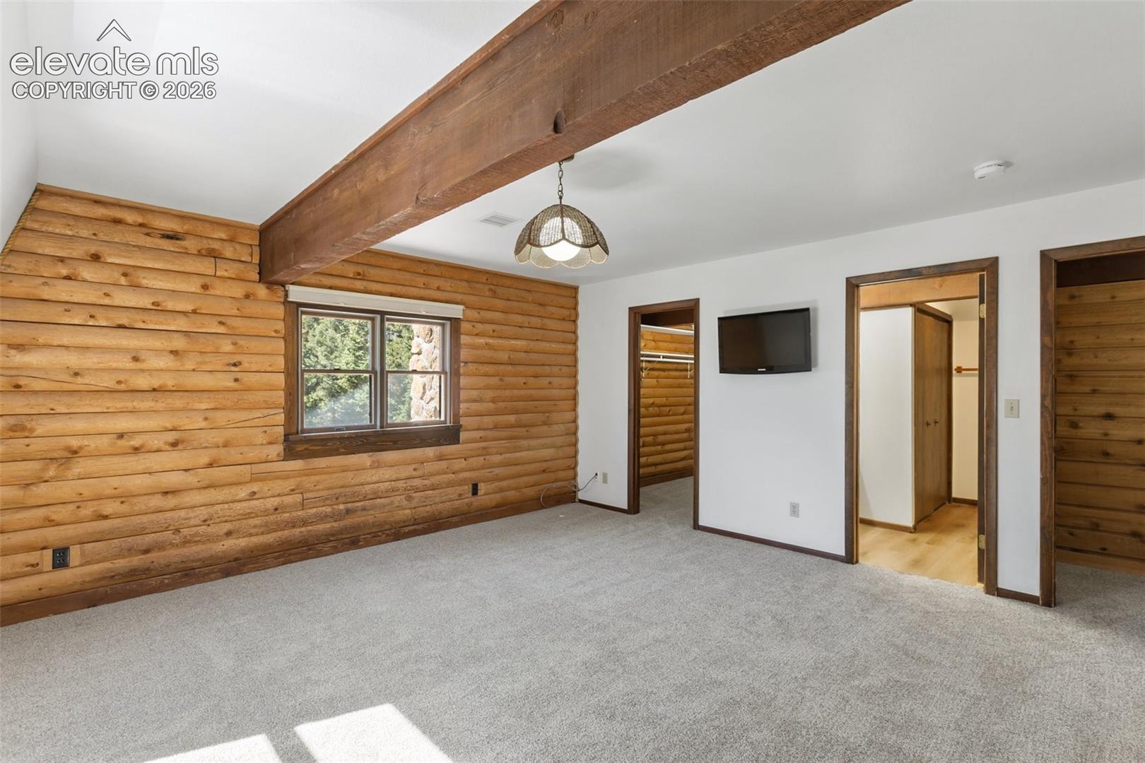 Two walk-in closets. Attached bath with washer/dryer. New flooring.