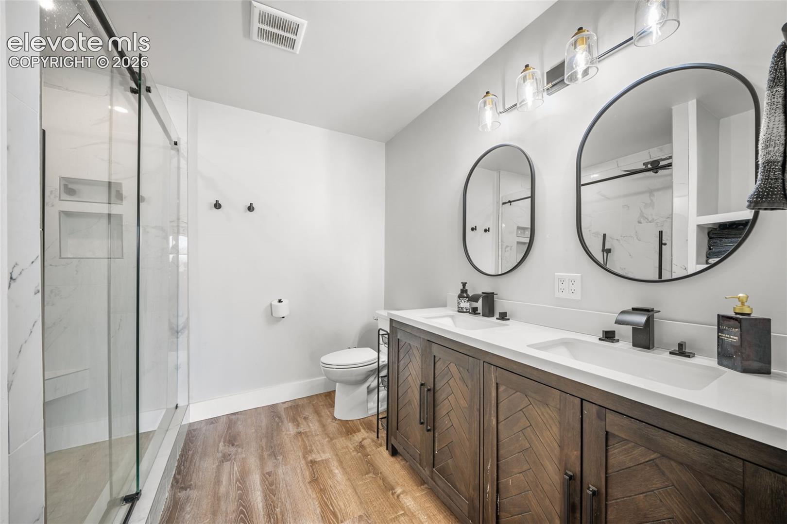 Stylish primary ensuite with dual sinks