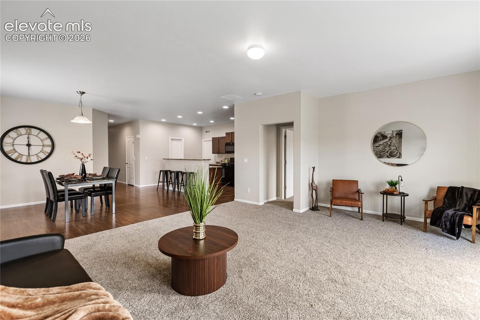 Living room/dining room is spacious and features brand new carpet with upgraded pad and freshly painted inside and out!