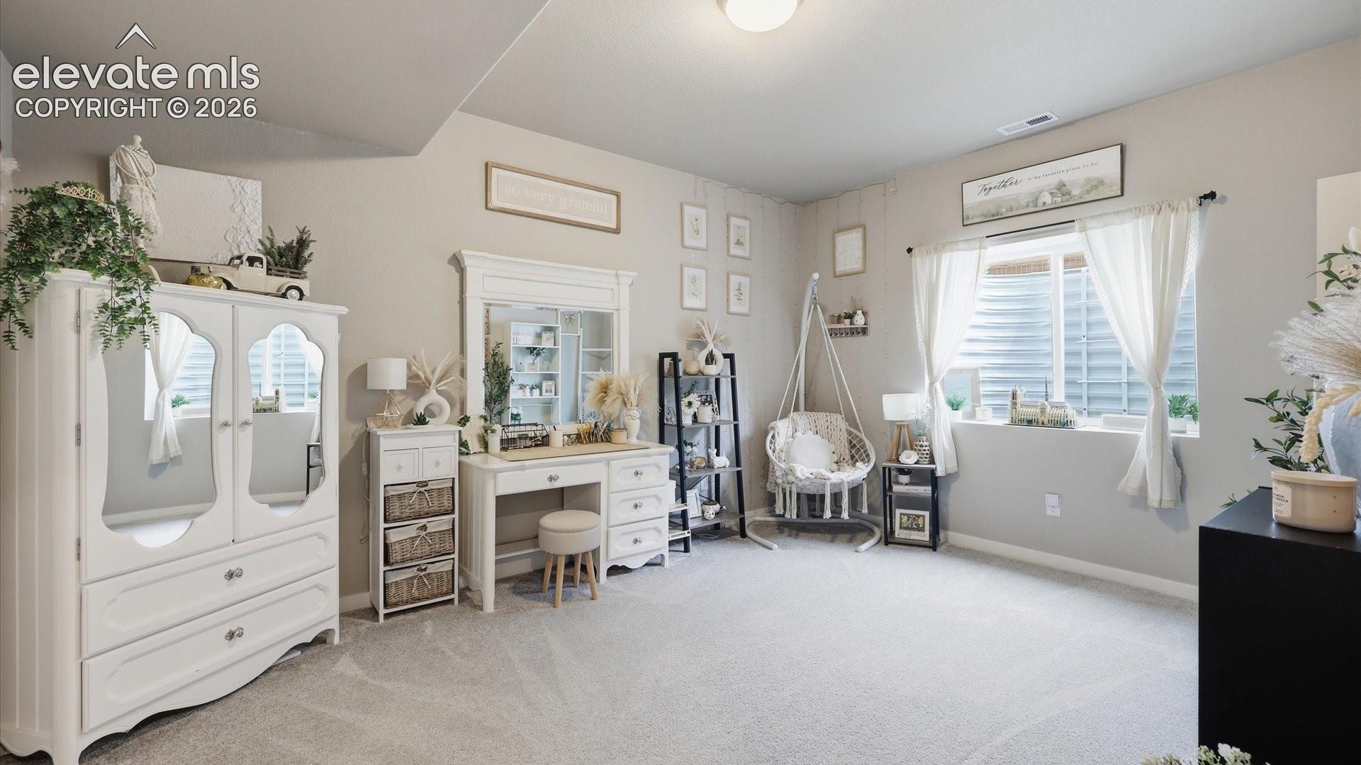 SPACE WITH POSSIBILITIES — Generous proportions make this bedroom equally suited for guests, family, a private home office, or a quiet personal retreat.