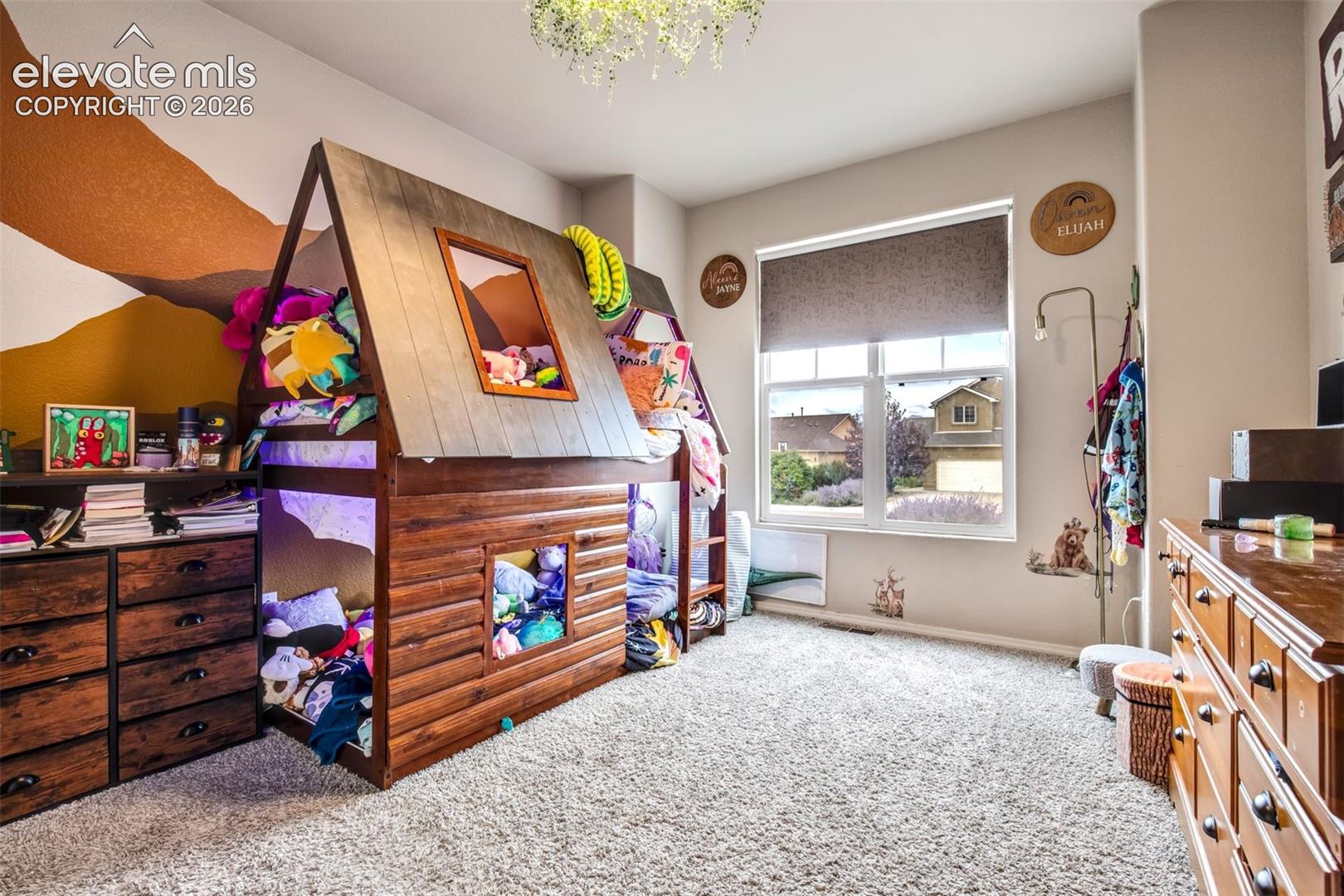 Front bedroom with mountain accent wall