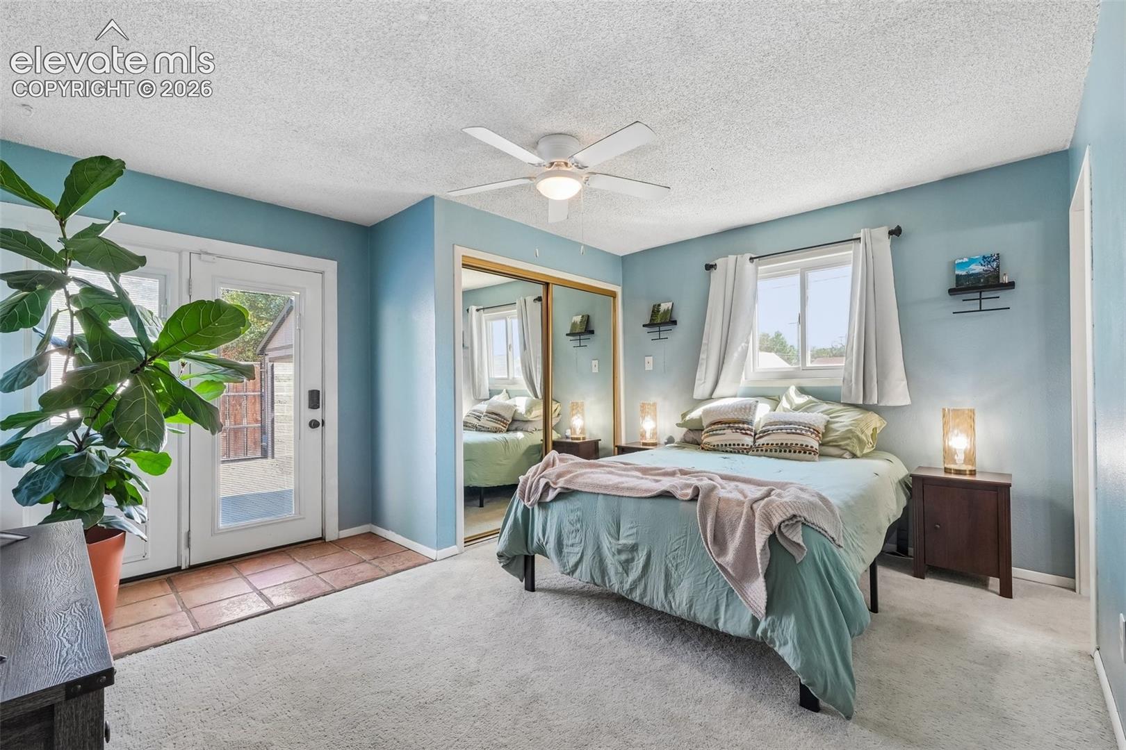Primary bedroom with 3/4 en suite and a walk out to private deck