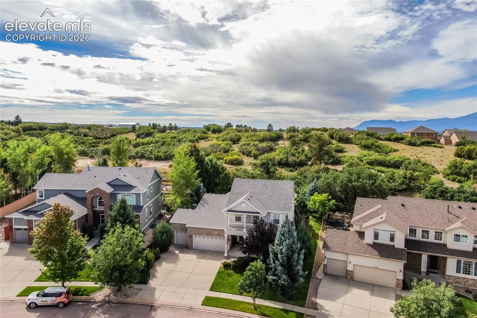 Home backs to open space and mature landscaping that offers total privacy!