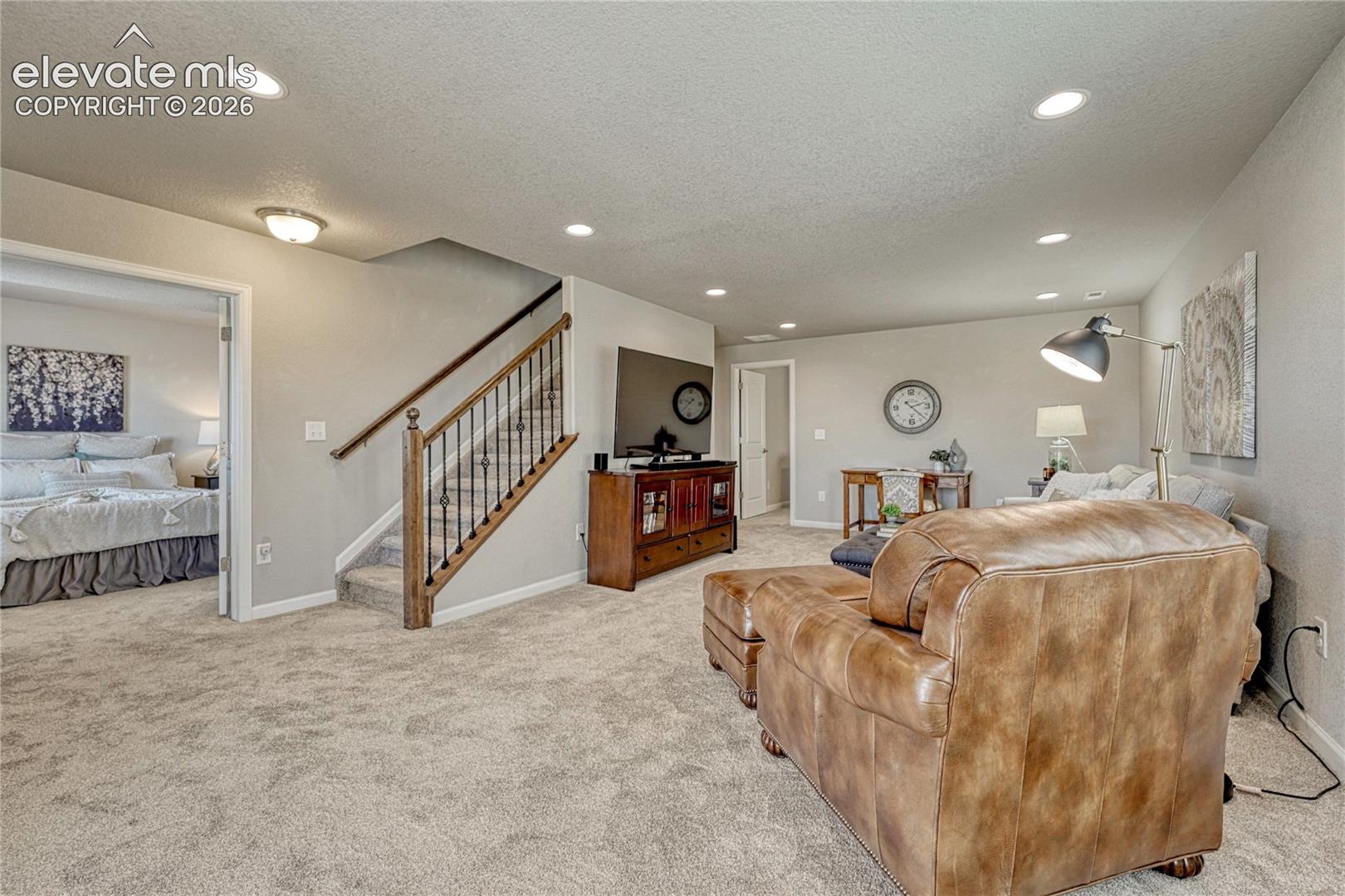 A flexible basement living area provides additional space for hobbies, movie nights, guests, or a comfortable retreat away from the main level.