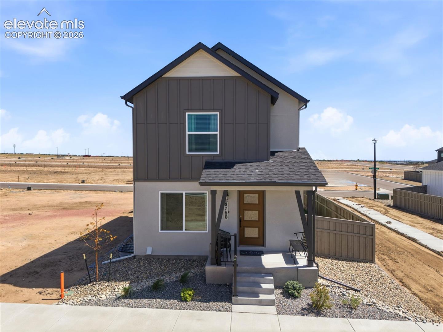 Ready now! 279 plan in the Villages at Sterling Ridge. Farmhouse exterior. Covered front porch. 3 bedroom, 2 bathroom, loft, 2 car detached garage home. ADU located above garage. Kitchen features Black Fox painted cabinets, elegant Calacatta Solano Quartz countertops, a large walk-in pantry, and stainless steel appliances including a refrigerator. Kitchen peninsula accommodates seating for three in addition to the dining area.  Access the covered patio from the kitchen. Upper level hosts two bedrooms, a full bath, loft and washer/dryer space. The finished basement includes a rec room, bedroom with a large walk-in closet and full bath. Full yard landscaping with irrigation included. Blinds in bedrooms and baths. Home comes equipped with a heat pump for heating and cooling and a radon mitigation system. The accessory dwelling unit (ADU), situated above the detached two-car garage and accessible through a separate entrance, presents an excellent opportunity for a rental space. Complete with a living area, full kitchen with all appliances, one bedroom, full bath, and dedicated stackable laundry space with washer and dryer, the ADU offers versatility and flexibility. Seller incentives available. Located in a covenant protected neighborhood.