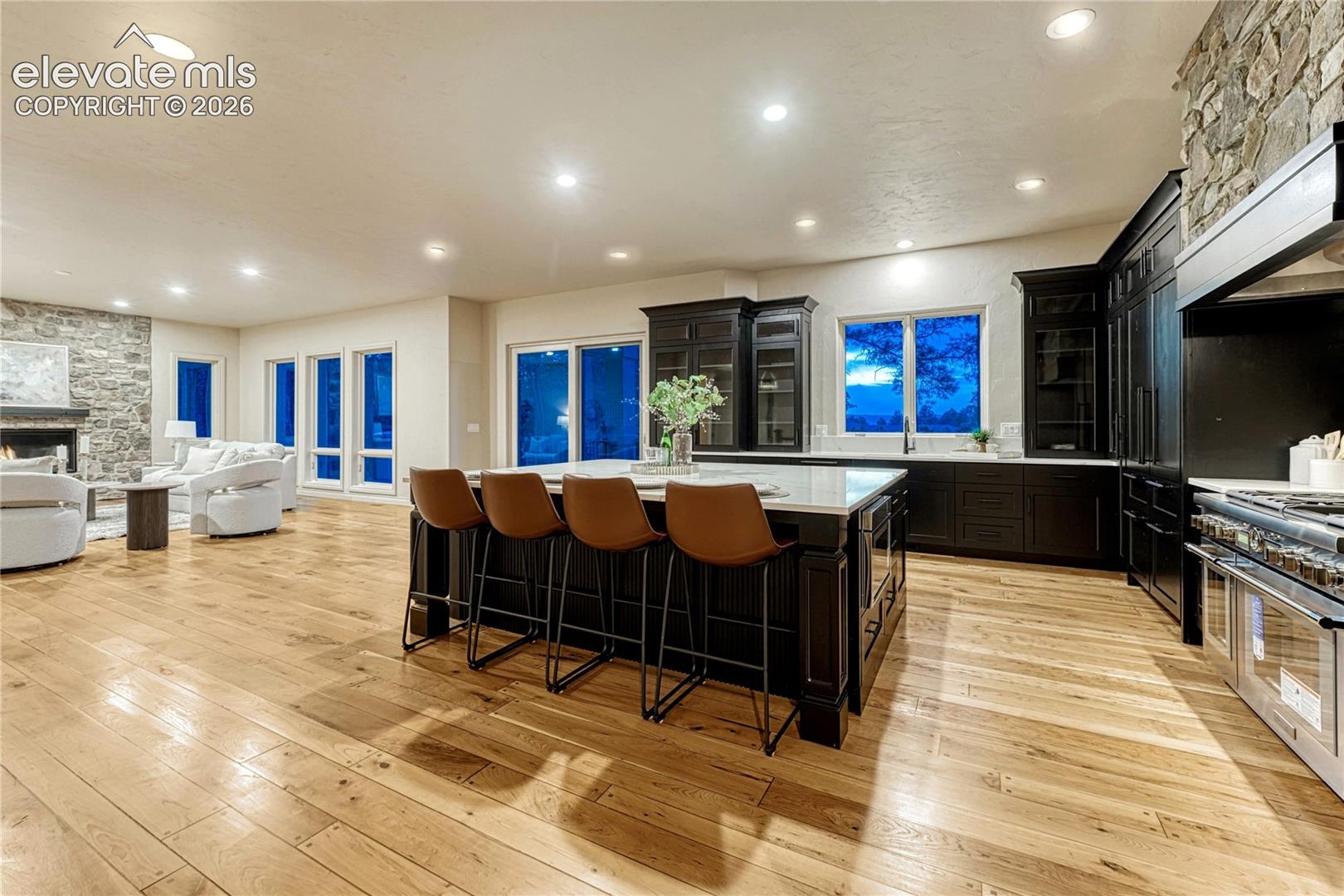 Luxury abounds, with newly finished cherry flooring and fresh paint. 