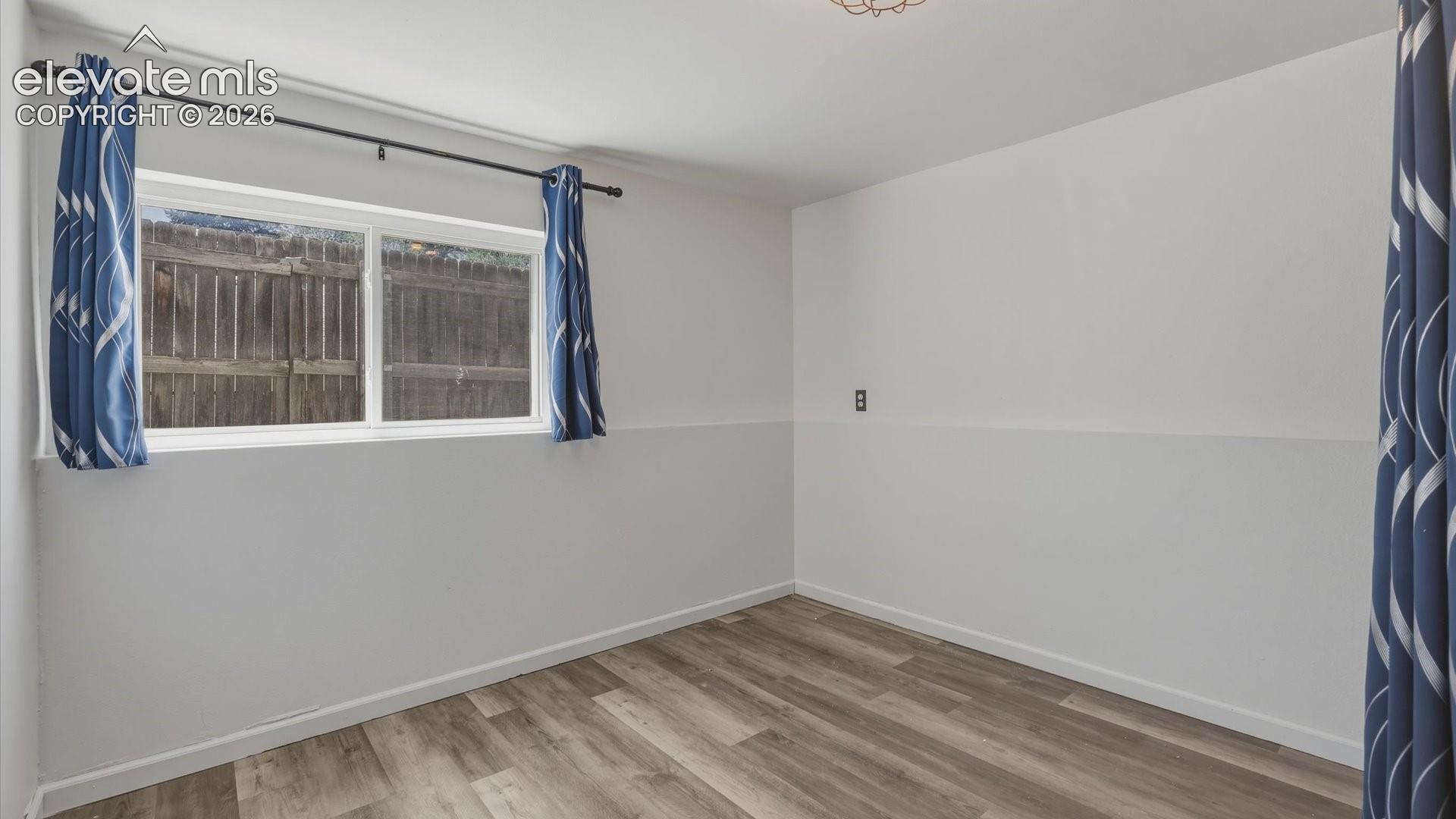 Lower Level Bedroom #4 with bamboo flooring.