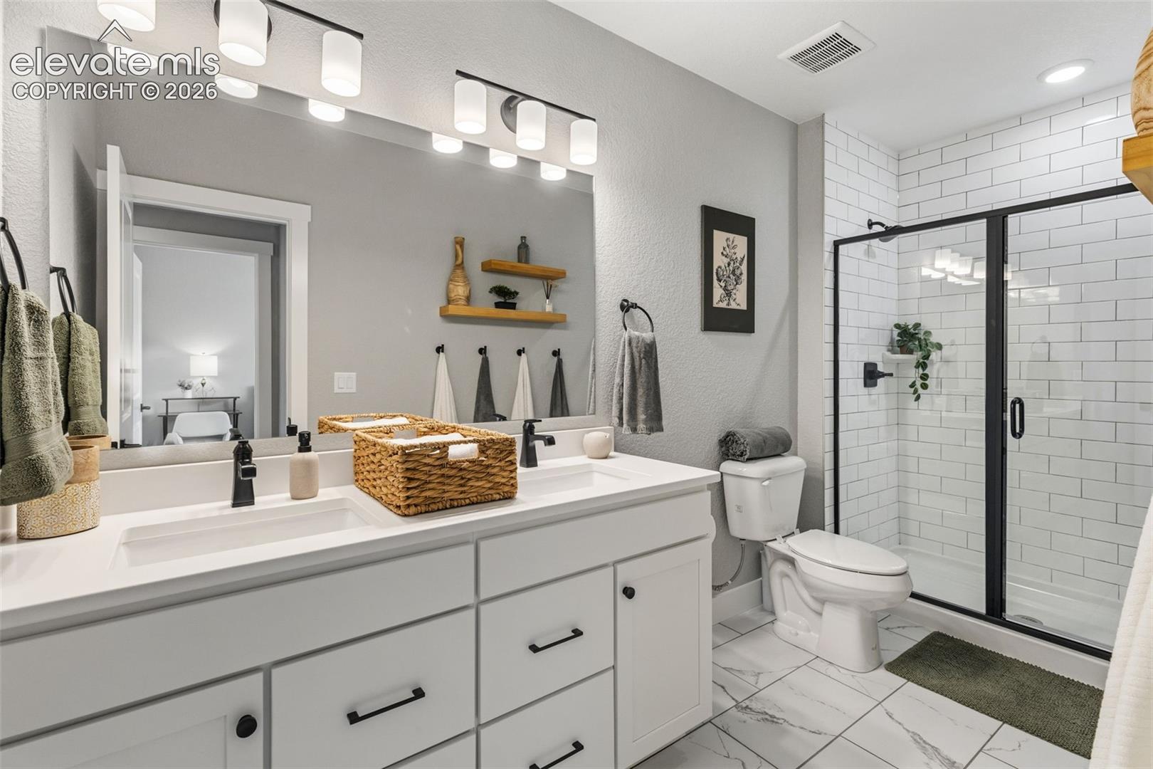 Full Bathroom just outside bedrooms 3 & 4
