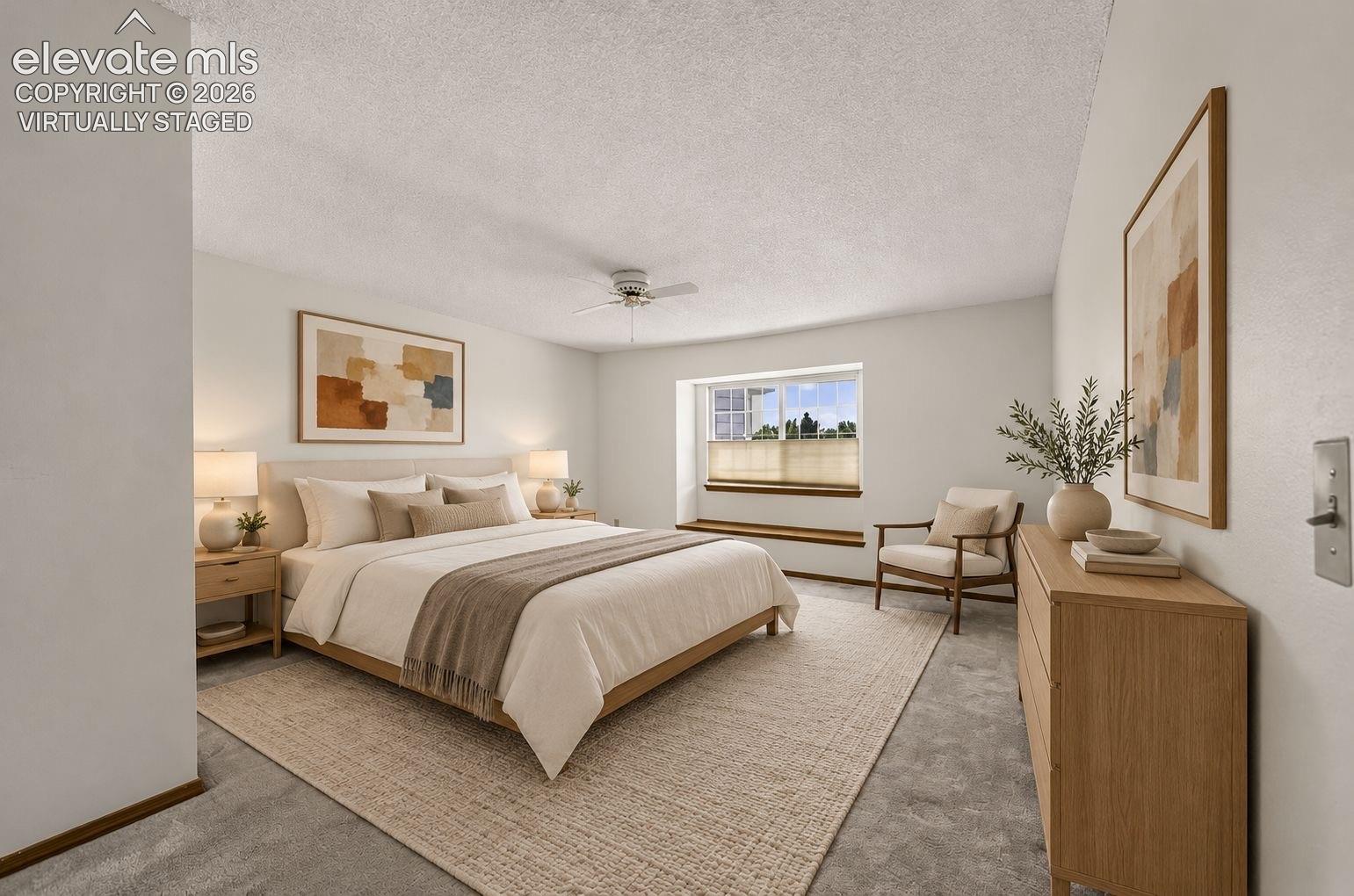 Large Master Bedroom w/window seat & en-suite bath.  Virtually Staged. 