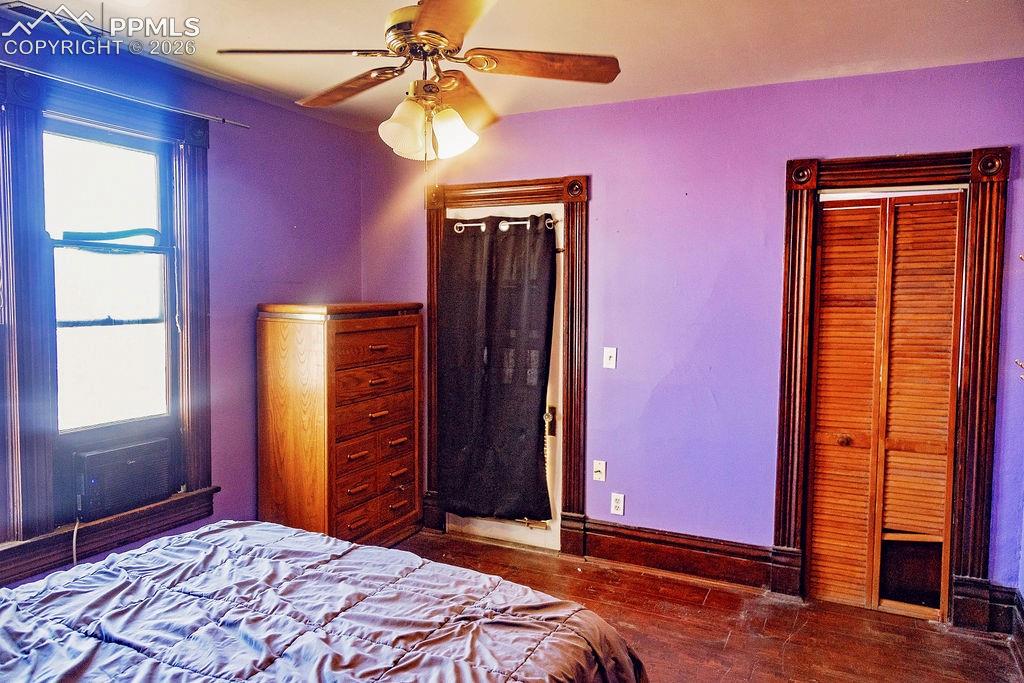 Primary Bedroom with Walk-In Closet & Covered Walk-Out Patio