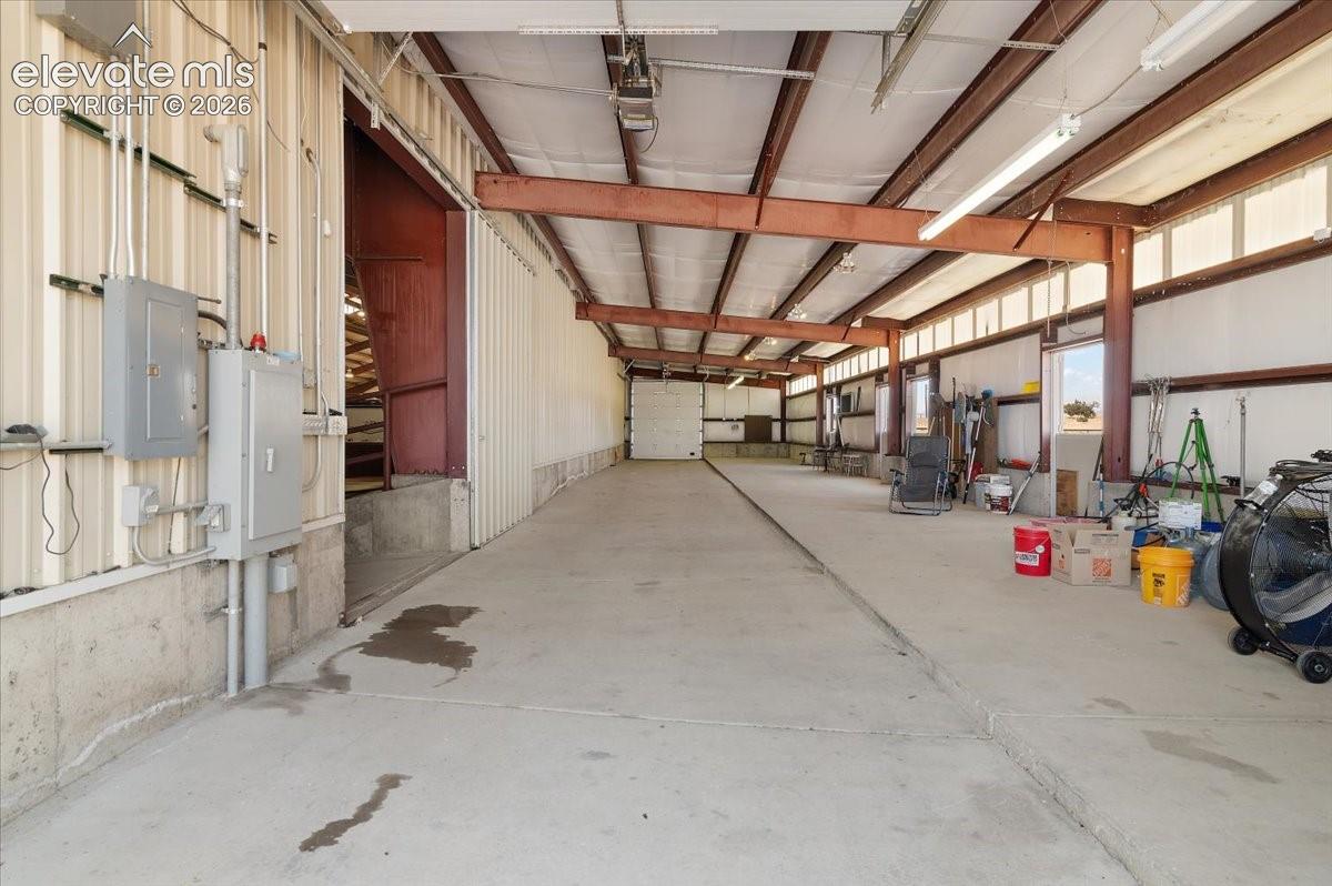 Horse stall area measures 24 ft. X 100 ft. Overhead door on each end of this area and 4 dutch doors.