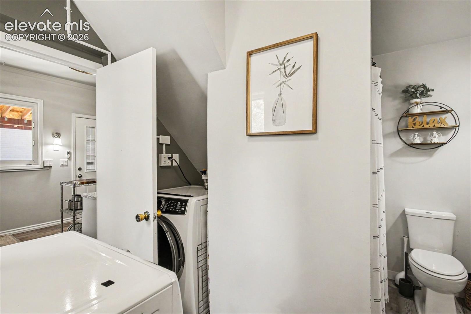 Remodeled master bathroom with laundry