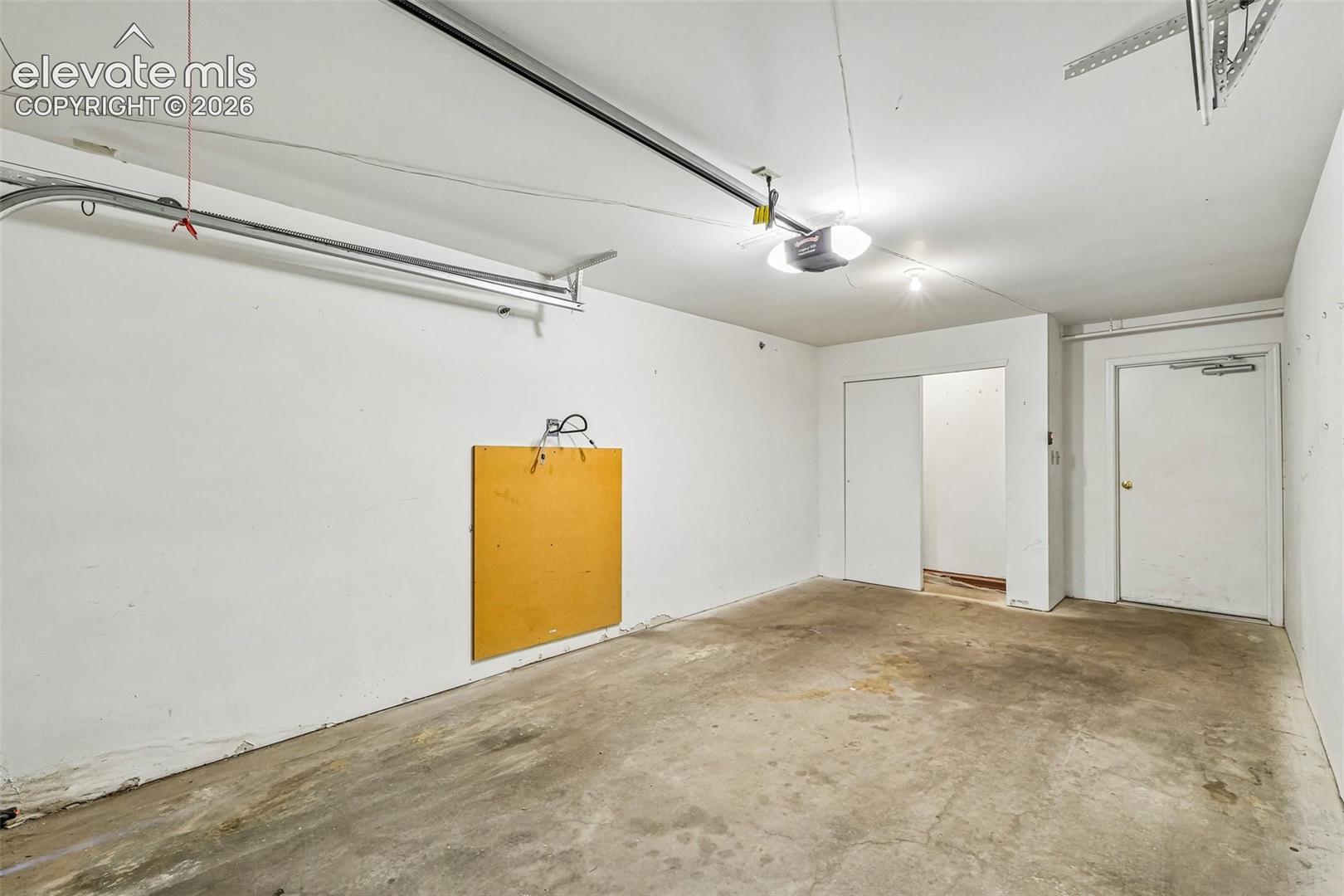 1 car attached garage with storage