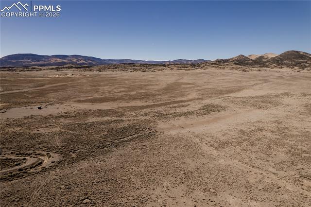View of mountain background featuring a desert landscape