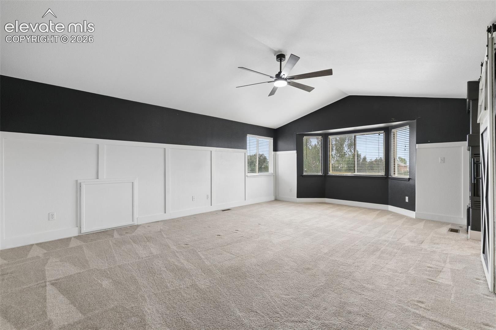 Oversized Retreat with Vaulted Ceiling & Sitting Area