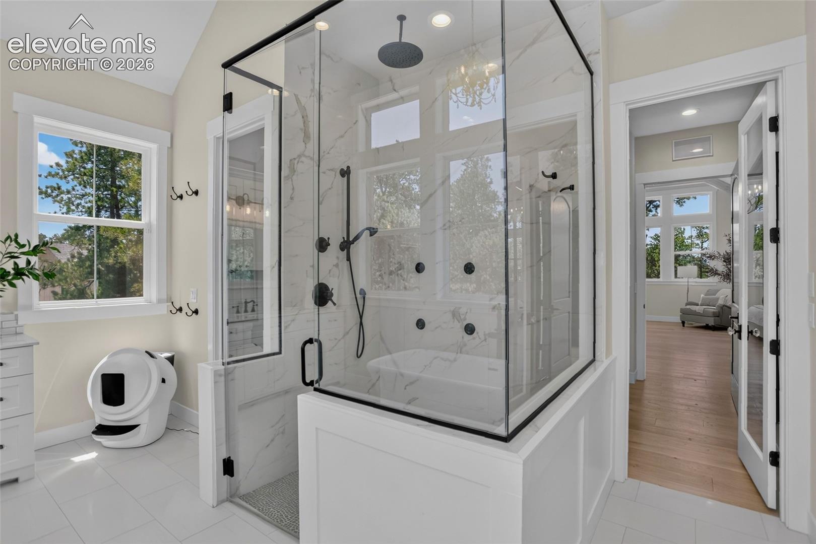 Zero-threshold shower w/ multiple shower heads