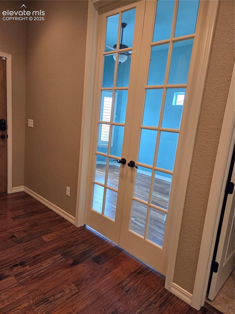 Office-Bedroom french doors, full bathroom next door.