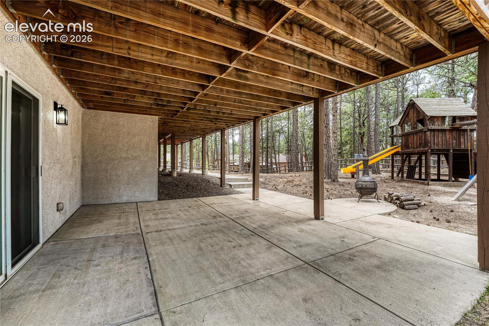 ...large, covered, concrete patio. 