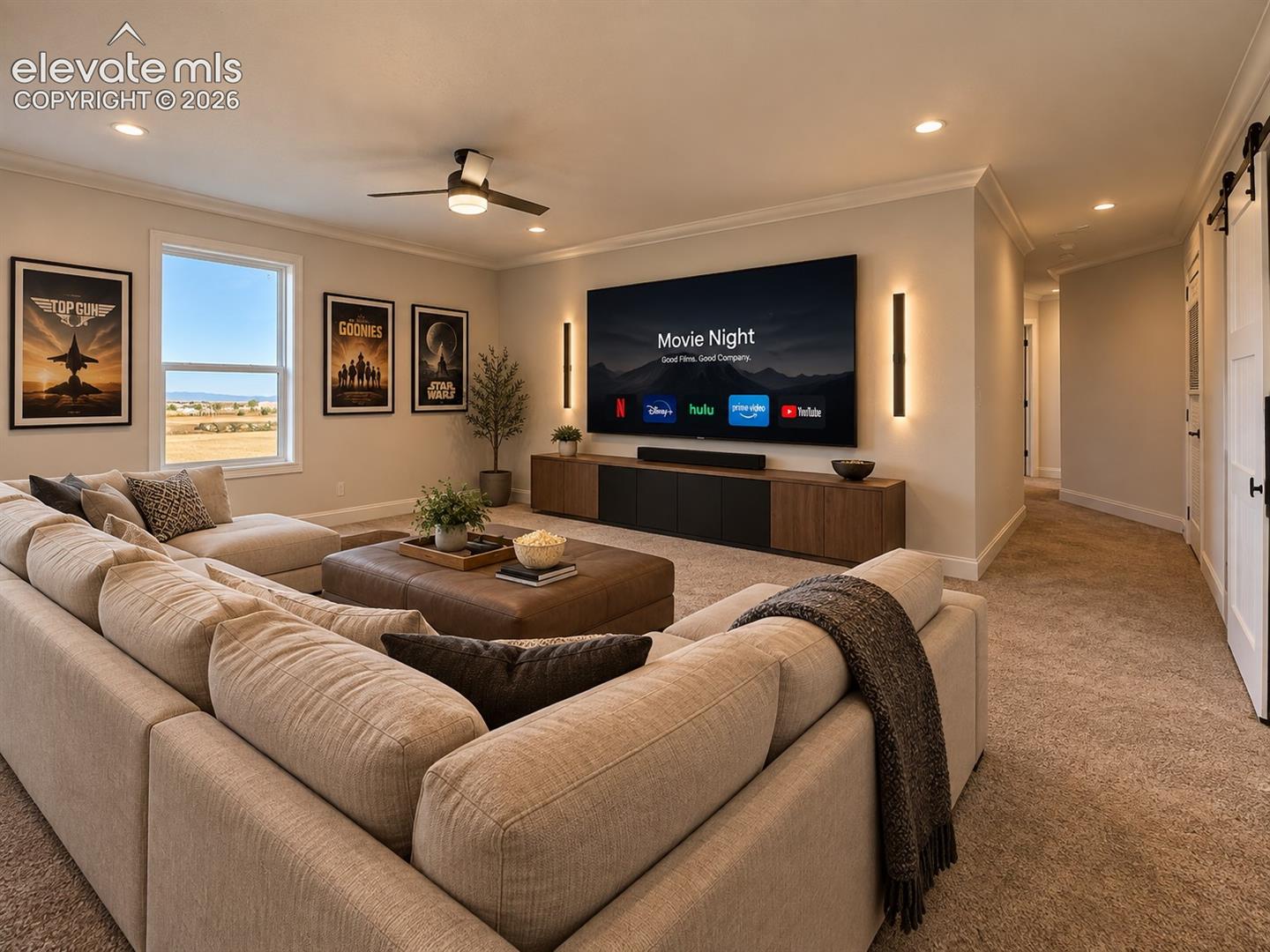 Another view highlights the generous proportions of the family room, abundant natural light, and an easy connection to the surrounding living spaces.