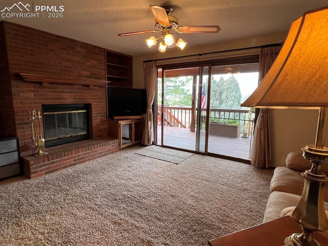 Family Room, Gas Fireplace, access to covered deck