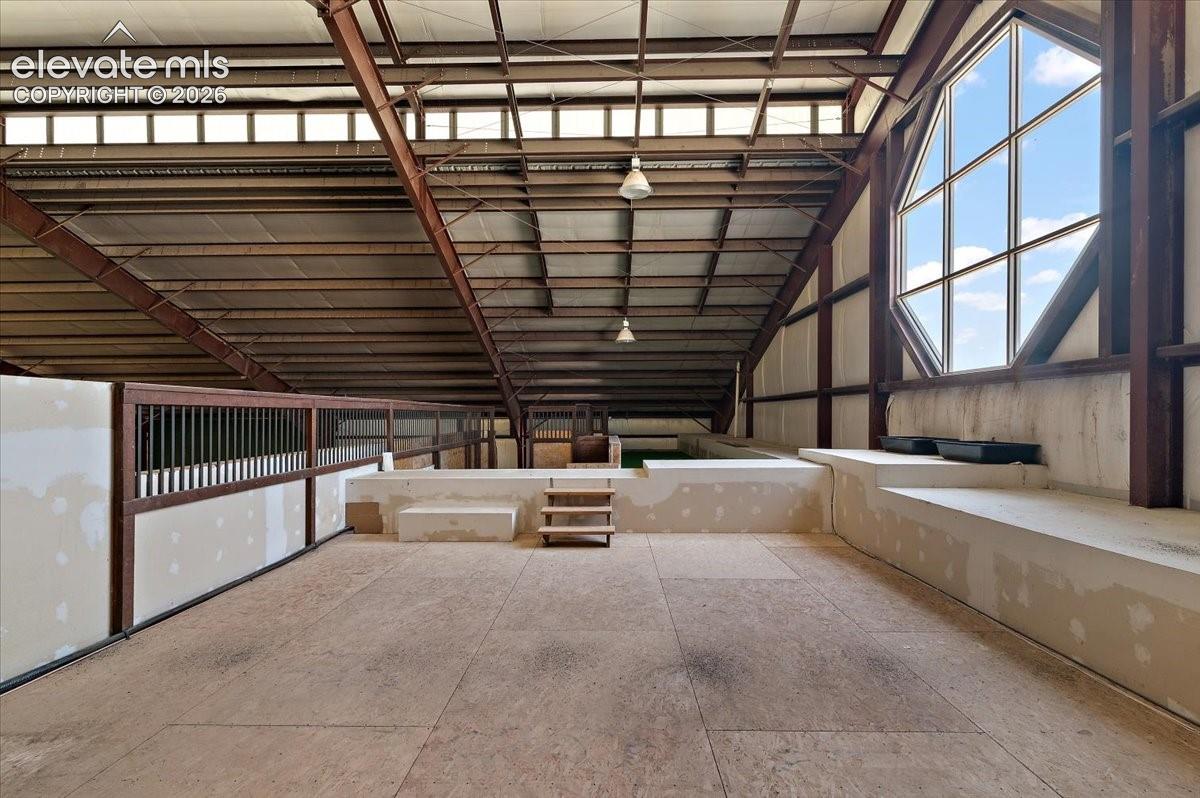 Upper level overlooking tennis court and arena.