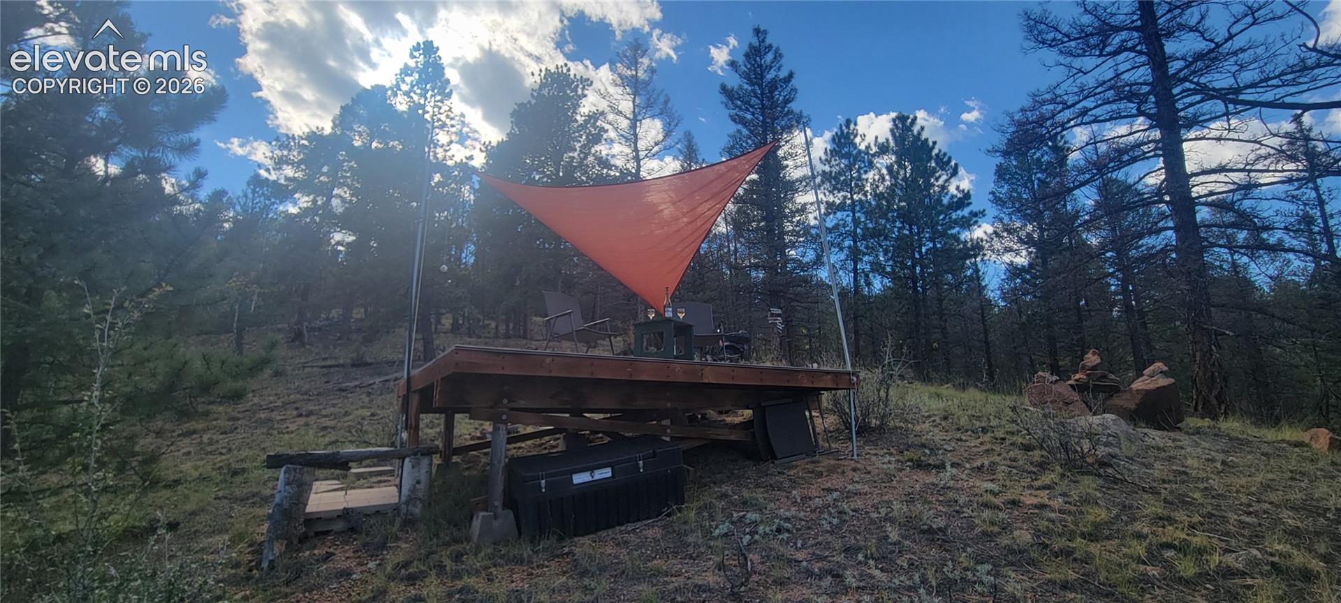Composite deck in approx the middle of the 20 acre lot