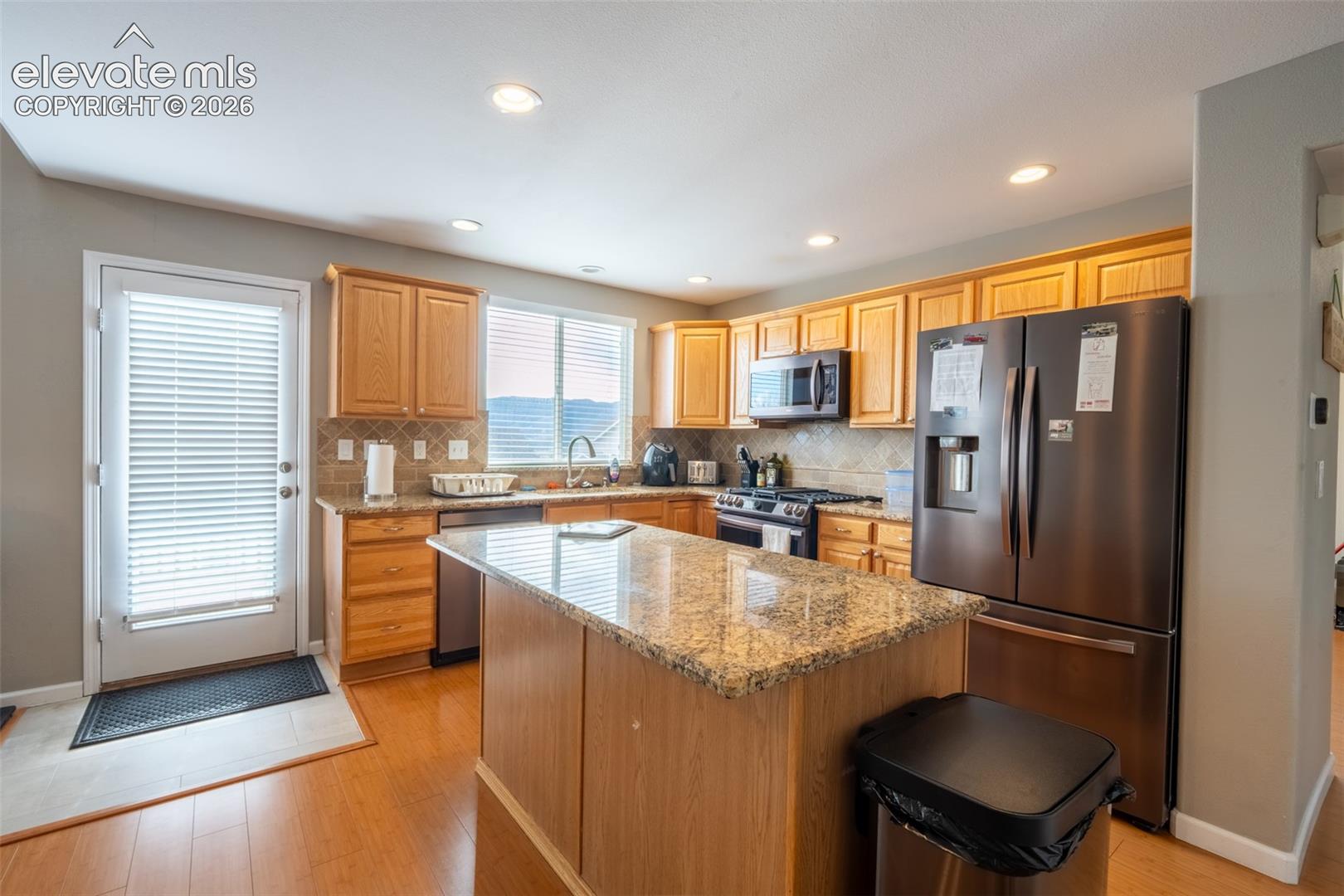 Kitchen with walk out deck - main floor