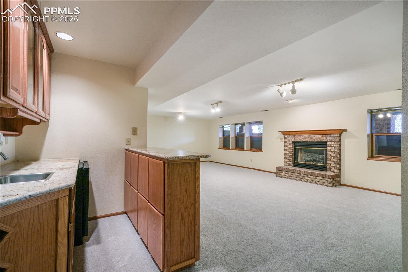 Basement mini bar, refrigerator included, granite countertops