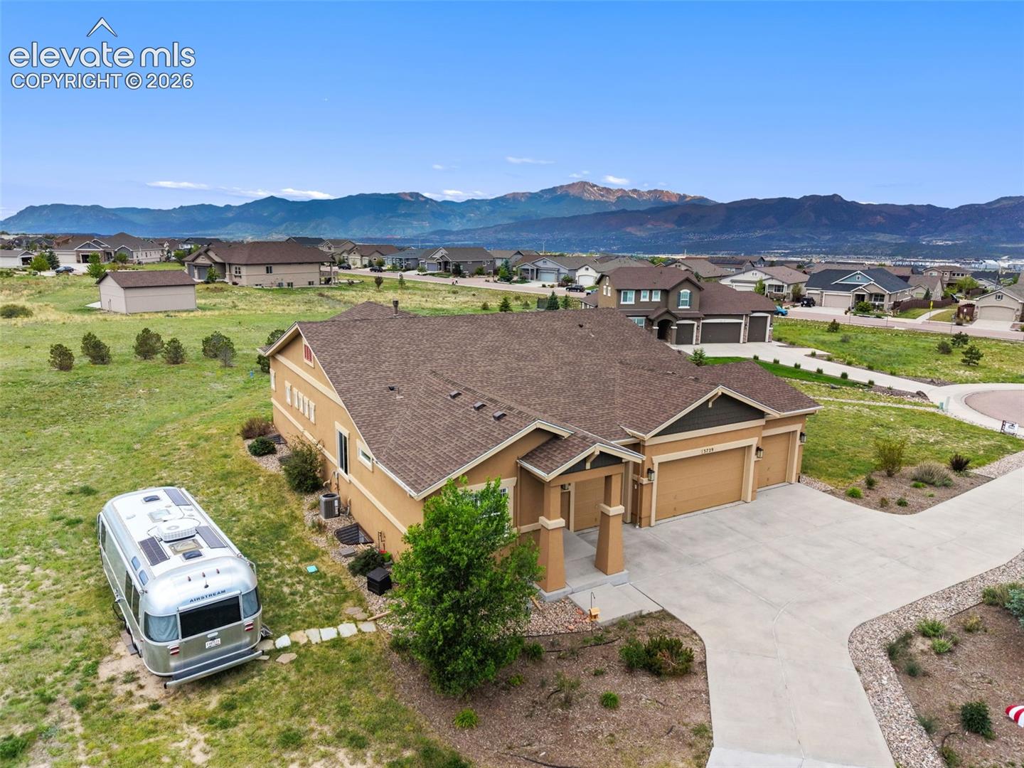 Aerial view of property featuring RV parking