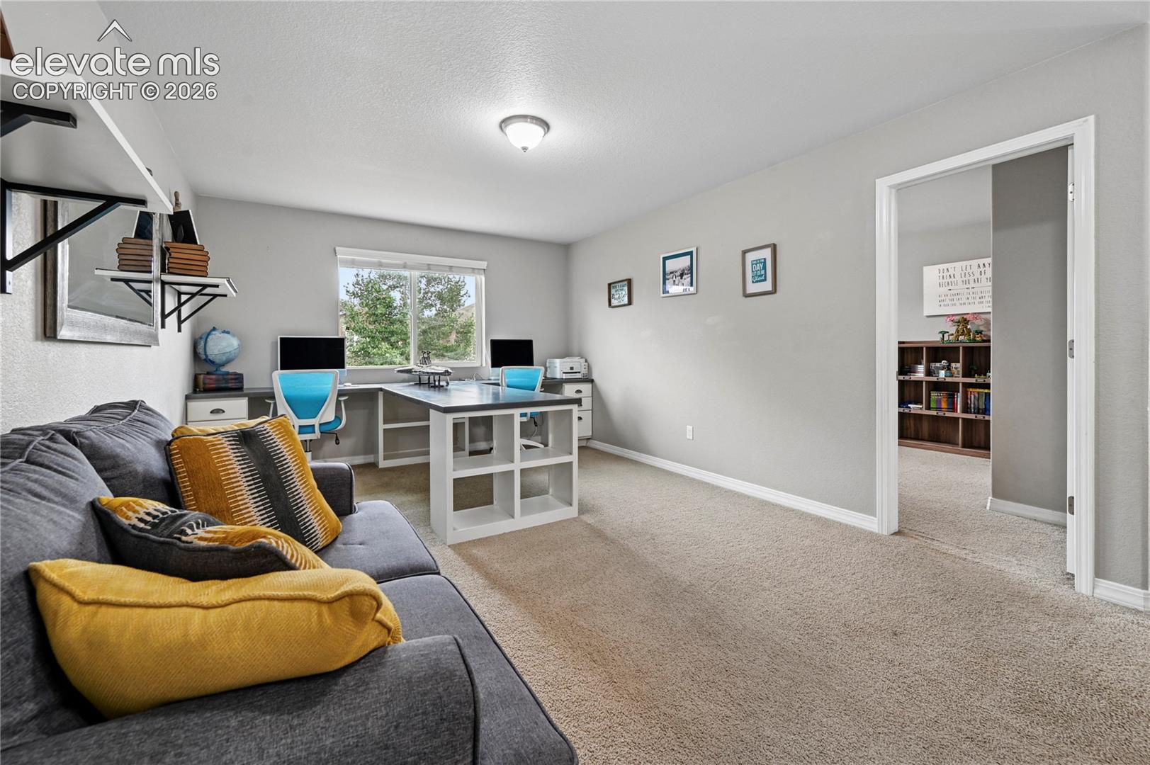 The loft is in the middle of the 3 upstairs bedrooms, and gives you even more family space in addition to the living room, main floor office, and basement family room.