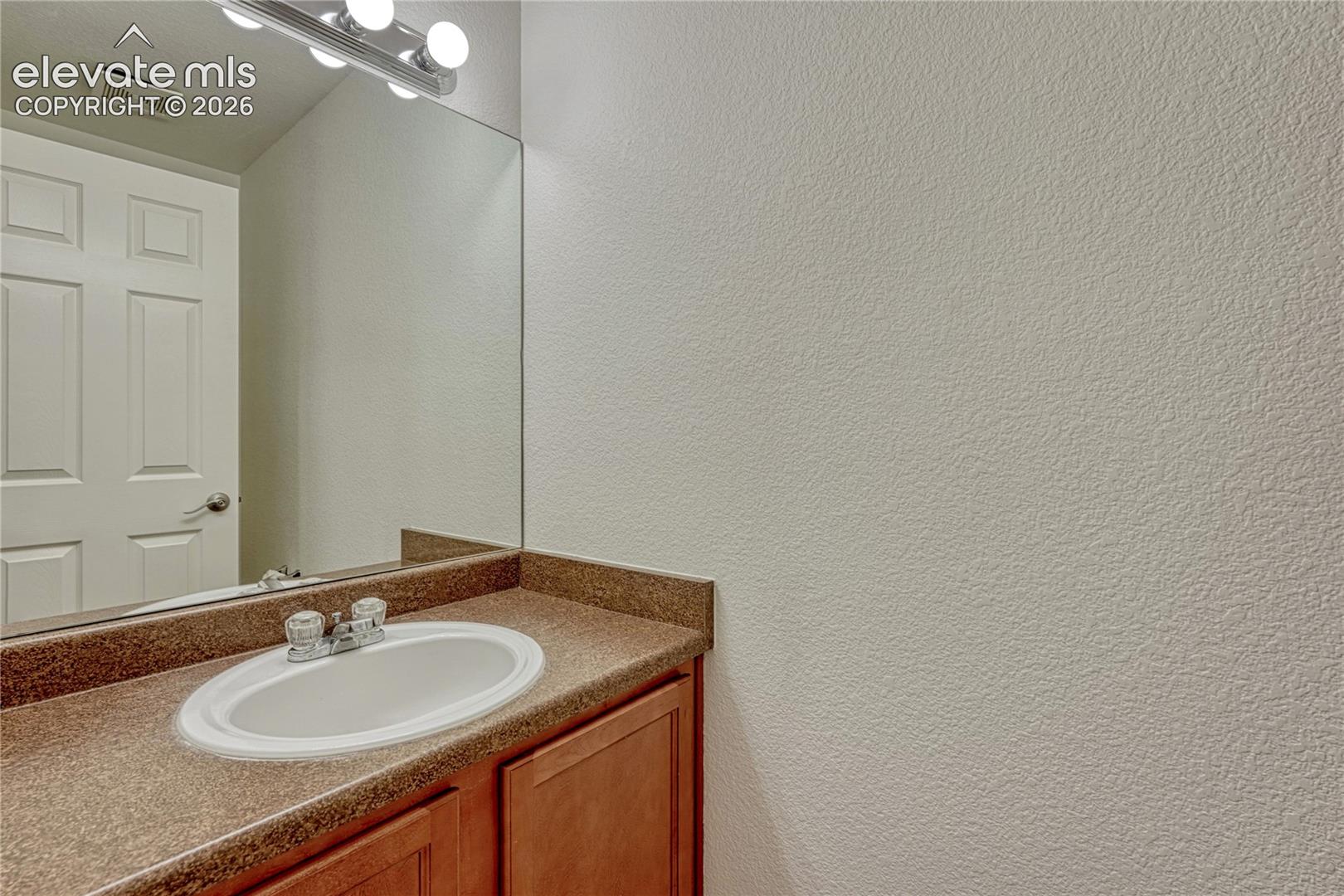 Main level powder room. 