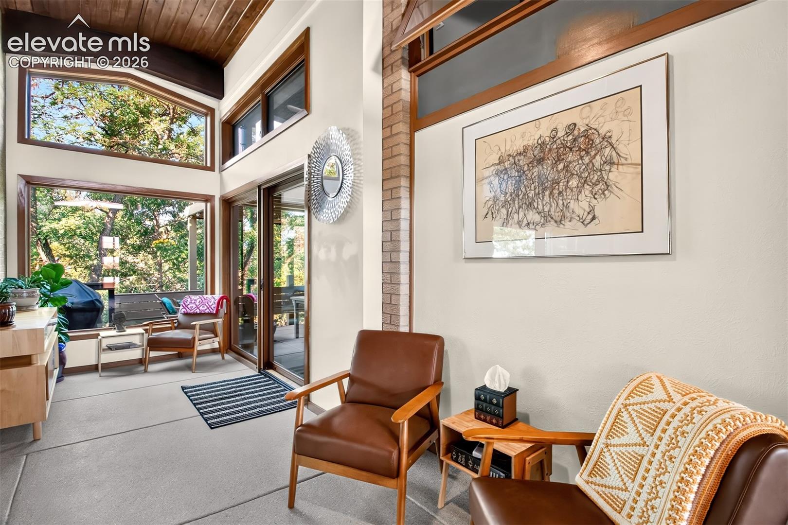 The sunroom opens to the outside  patio