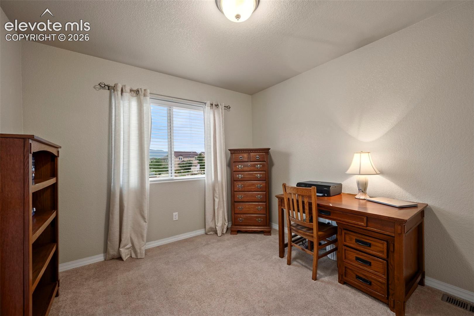 Front bedroom off entry currently being used as an office.