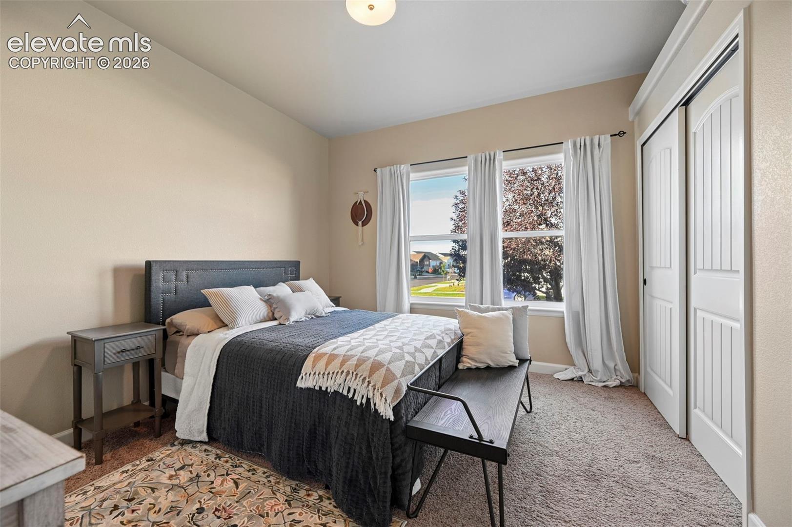 Three large windows with white trim