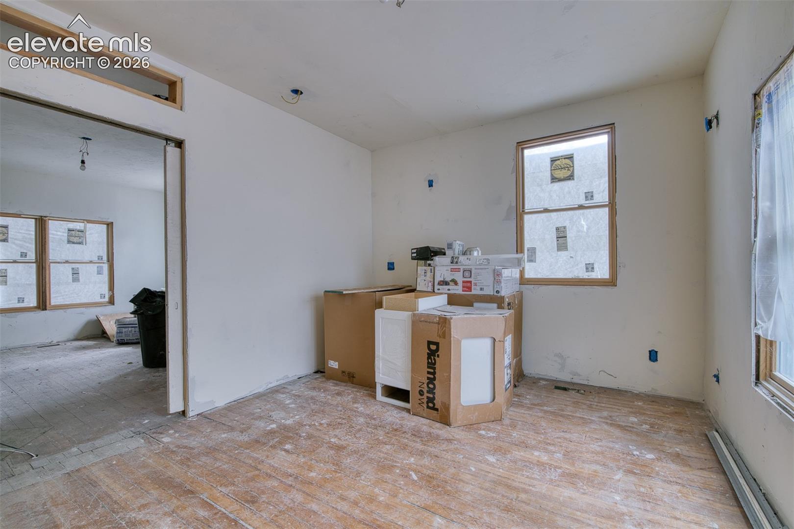 Primary bedroom with pocket door entry off living room. 